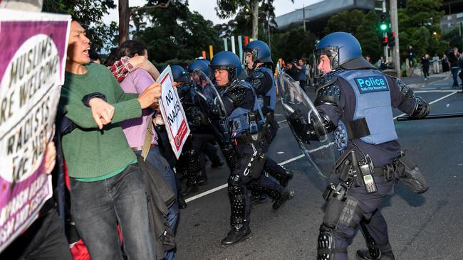 Police in riot gear disperse protesters. Picture: Jake Nowakowski