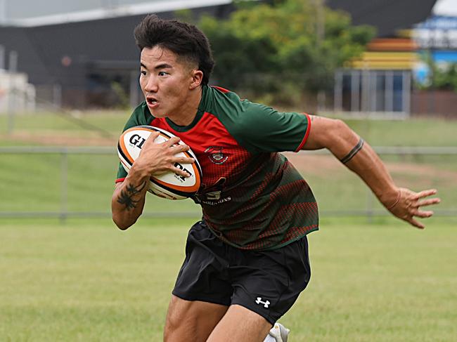 Shunsei Okazaki making a run for South Darwin's B-grade side. From The Sideline Sports Photography