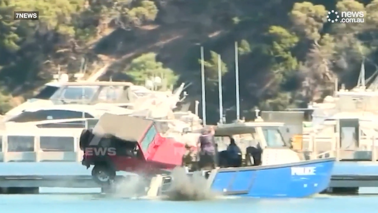 Man drives car into Swan River during police stand-off