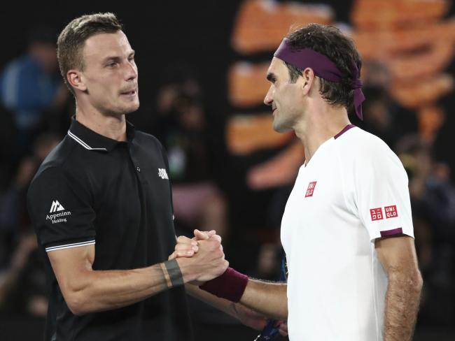 Hungary's Morton Fucsovics congratulates Federer as he crashes out of the Australian Open.