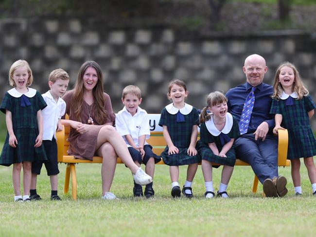 Coast Christian School Principal Matthew Drennan with Kindergarten teacher Georgina Battle and their 2022 class. Picture: Sue Graham