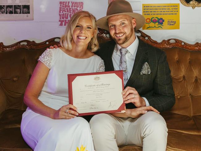 Jacob Vennix with his wife Kimberley Fuller after they signed the marriage certificate. Picture: Facebook