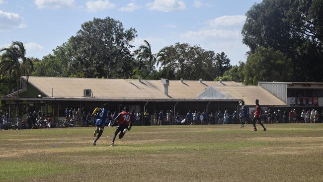 Buffaloes' Dwayne Kerinauia and Bombers' Adam Tipungwuti at the Tiwi Island Football League grand final. Picture: Max Hatzoglou