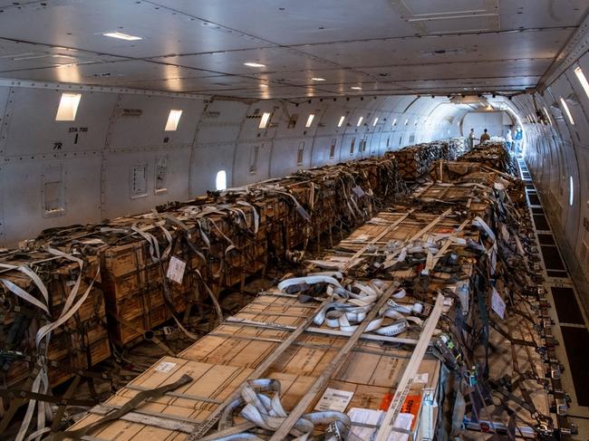 Airmen from the 60th Aerial Port Squadron loading cargo on to a 757 at Travis Air Force Base, California. Picture: US Airforce/AFP