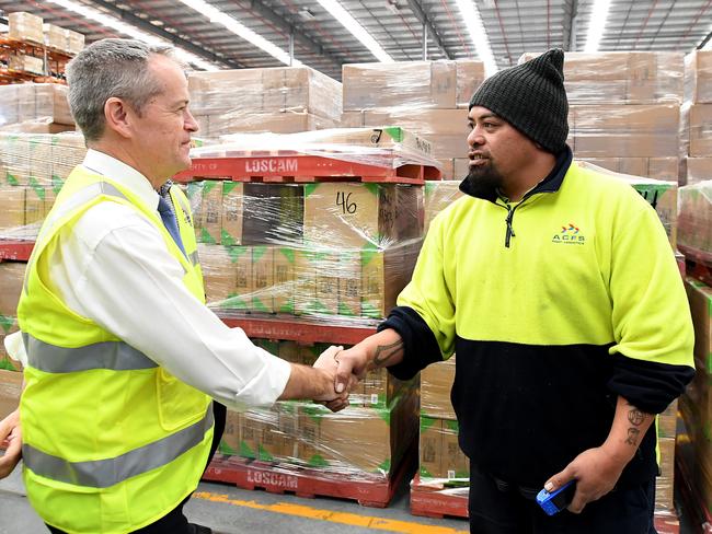 Bill Shorten meets worker Tom Ofanoa during a visit to ACFS Port Logistics in Brisbane this week. Picture: AAP