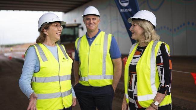 Federal Minister for Infrastructure, Transport, Regional Development and Local Government, Catherine King (L), Minister for Infrastructure, Planning and Logistics Joel Bowden, with Chief Minister Eva Lawler (R) celebrate 60 per cent of works complete on Tiger Brennan Drive on March 13, 2024.