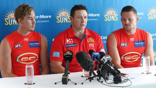 Gold Coast Suns coach Stuart Dew with co-captains Tom Lynch and Steven May. Picture: Mike Batterham