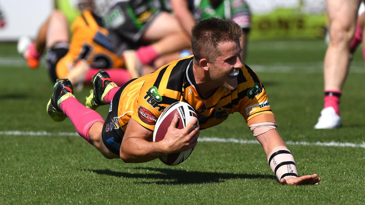 MEMORIES: Sunshine Coast Falcons halfback Todd Murphy on his way to scoring a try last year. PHOTO: Warren Lynam