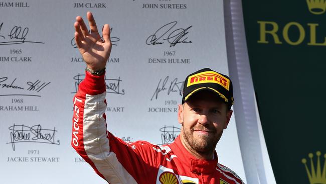 BUDAPEST, HUNGARY - JULY 29: Second place finisher Sebastian Vettel of Germany and Ferrari celebrates on the podium during the Formula One Grand Prix of Hungary at Hungaroring on July 29, 2018 in Budapest, Hungary. (Photo by Charles Coates/Getty Images)