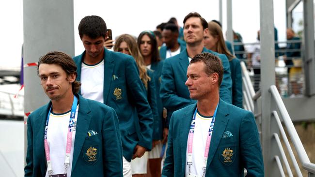 Alex De Minaur and Lleyton Hewitt arrive on the team boat. Photo by Quinn Rooney / POOL / AFP.