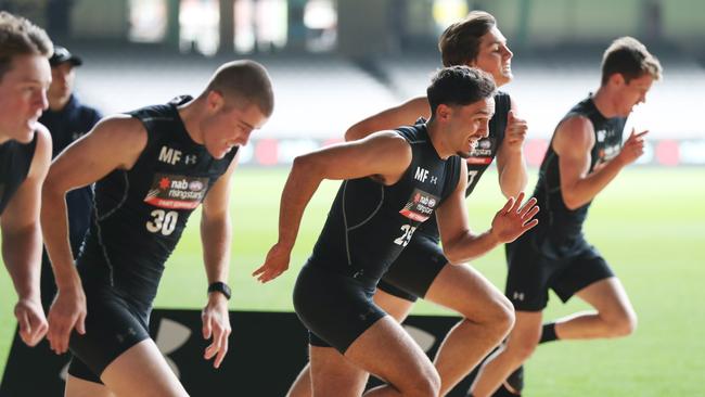 West Adelaide's Izak Rankine, third from left, blazes the track during the 2018 AFL Draft Combine at Marvel Stadium. Picture: AAP Image/David Crosling