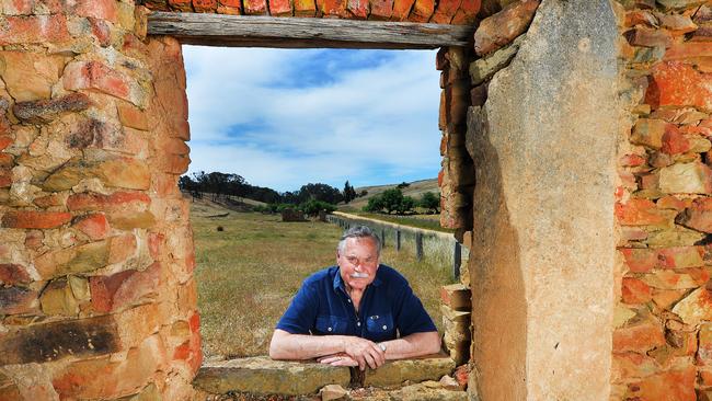 The Vingt Cinq Club, old sportsmen of various vintages and hues, mostly footballers _ are taking one of their number, R. D. Barassi, back to where he came from, the small town of Guildford .Barassi at the old family ruins at Guildford.Picture:Rob Leeson.