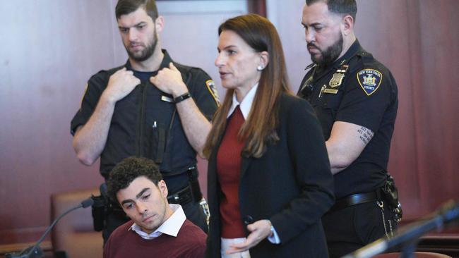 Luigi Mangione with his lawyer Karen Friedman Agnifilo, appears in Manhattan Supreme Court in New York on December 23, 2024. (Photo by Curtis Means / POOL / AFP)