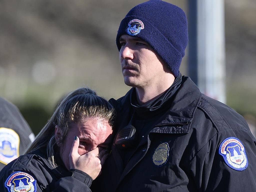 US Capital police react after the casket with fallen police officer, Brian Sicknick, passed during a funeral procession in Washington, DC. Picture: AFP