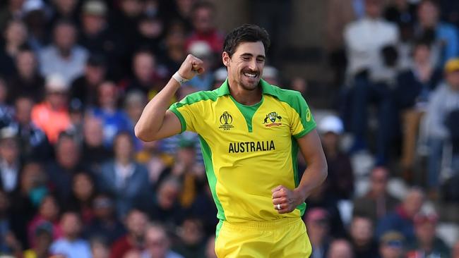 TOPSHOT - Australia's Mitchell Starc celebrates after taking his fifth wicket, that of West Indies' Sheldon Cottrell during the 2019 Cricket World Cup group stage match between Australia and West Indies at Trent Bridge in Nottingham, central England, on June 6, 2019. - Australia beat West Indies by 15 runs. (Photo by Paul ELLIS / AFP) / RESTRICTED TO EDITORIAL USE