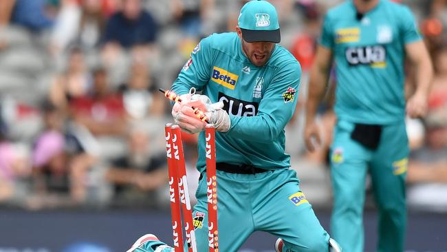 Brisbane Heat’s AB de Villiers breaks the stumps during the Big Bash League match against Melbourne Renegades at Marvel Stadium in January. Picture: Getty Images