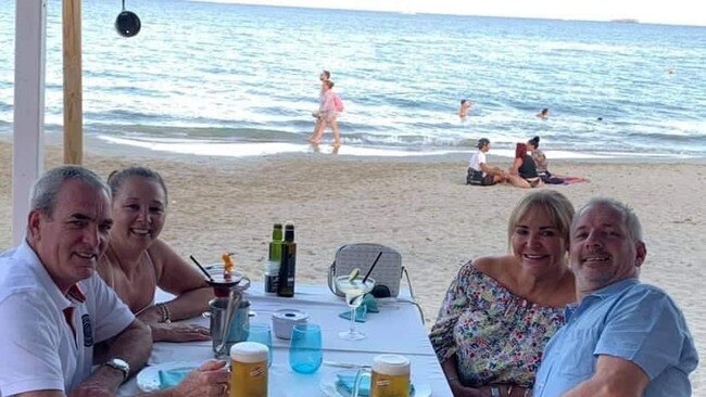 Diane and Ron Hughes enjoying lunch with family on the Gold Coast. Picture: Supplied