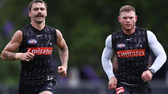 Taylor Adams (right) and Oleg Markov run laps during Collingwood’s pre-season. Picture: Michael Klein