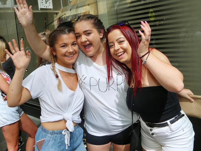 Brooke Cutajar, Jessica Surenyan and Tiana Cananzi queue to enter the Justin Bieber pop-up shop. Picture: Hamish Blair