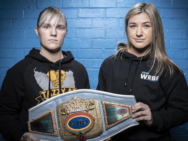 Krystina Jacobs with opponent Lorrinda Webb. Picture: Eddie Safarik