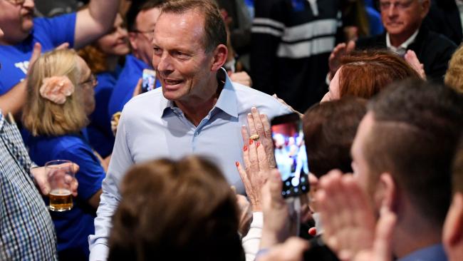 Former Prime Minister and Warringah Liberal candidate Tony Abbott is greeted by supporters as he enters before conceding defeat at  Manly Leagues Club in Brookvale, Sydney. Photo: AAP Image/Bianca De Marchi) 