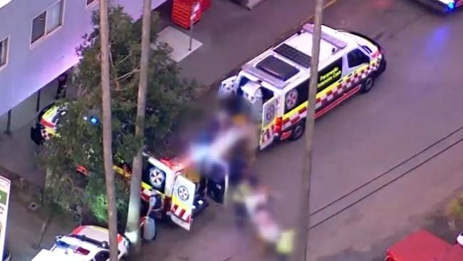 Burns victims being taken to hospital. Picture: 7 News