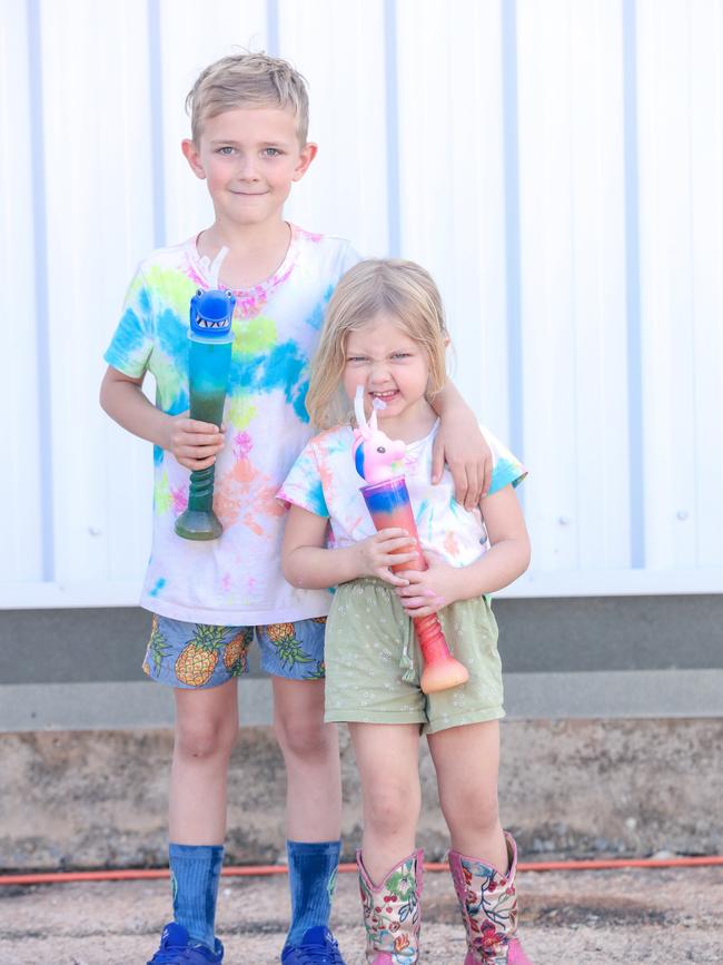 Hannah, 3, and Jai Holzfeind, 8, enjoying day one of the Royal Darwin Show. Picture: Glenn Campbell