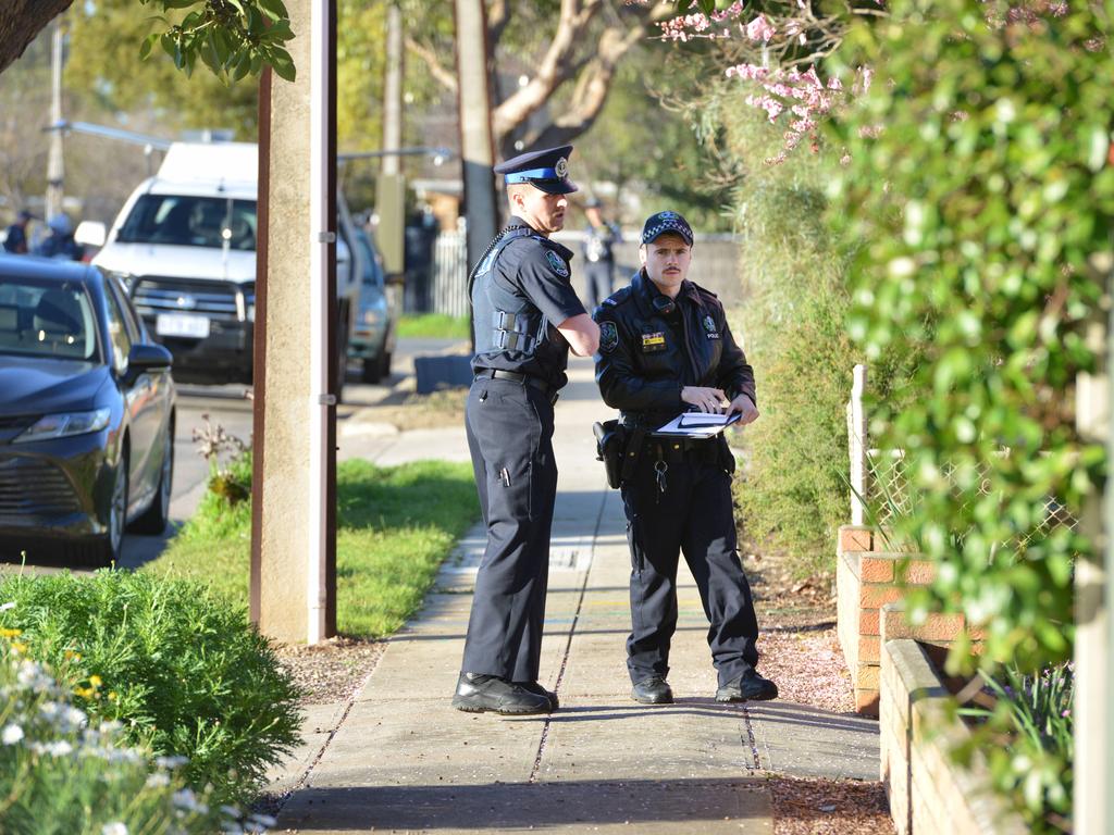 Police examined the scene at the North Plympton home where Mr Barber’s body was found deceased in the backyard. Picture: AAP/Brenton Edwards