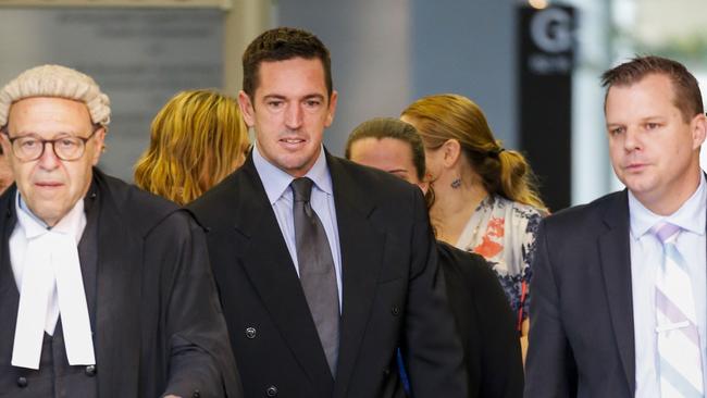 Inside the courtroom: Former soldier Christopher Carter (centre) leaves the Brisbane Supreme Court a free man. Picture: AAP Image/Glenn Hunt