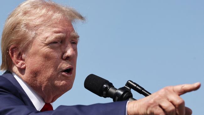 Republican presidential nominee, former US president Donald Trump, gestures at a press conference at Trump National Golf Club Los Angeles on September 13. Picture: Getty Images