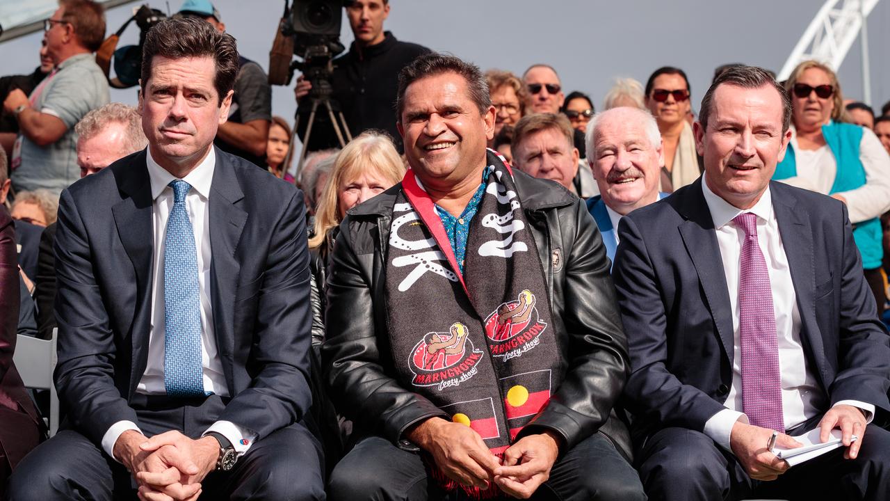 Gillon McLachlan and Mark McGowan with Nicky Winmar in Perth in 2019.