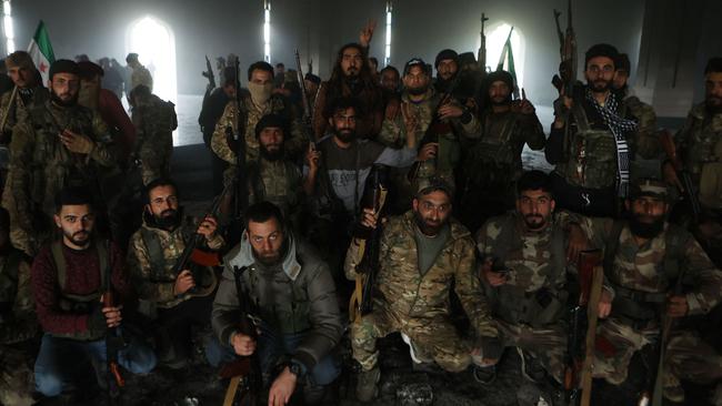 Rebels at the mausoleum. Picture: AFP