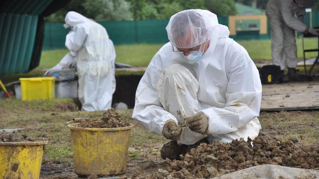 An archaeological team conduct work at the excavation site at Fromelles in May 2014. Picture: Supplied