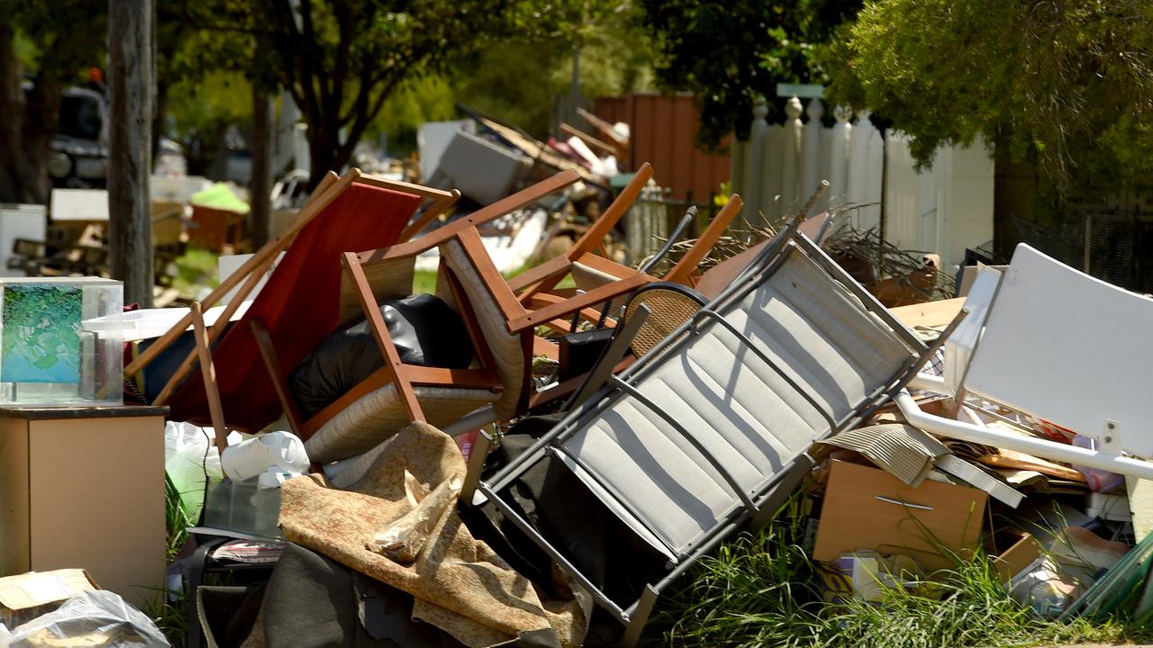 Household debris still piled in on the side of the road in Hermit Park following the devastating 2019 Townsville floods. Picture: Evan Morgan