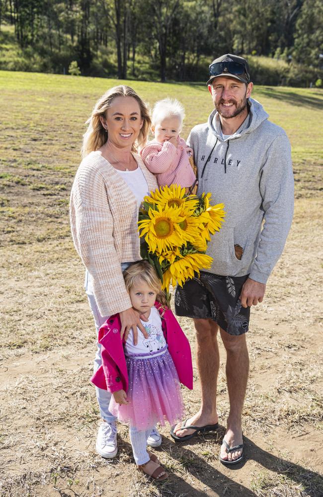 Allycia and Jack Pender with their kids Isabelle (left) and Sophia at the picnic with the sunflowers event hosted by Ten Chain Farm, Saturday, June 8, 2024. Picture: Kevin Farmer