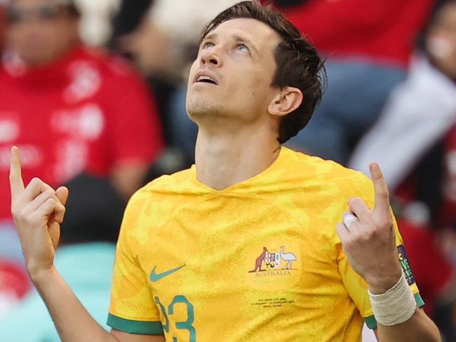 DOHA, QATAR - JANUARY 28: Craig Goodwin of Australia celebrates after scoring his team's third goal during the AFC Asian Cup Round of 16 match between Australia and Indonesia at Jassim Bin Hamad Stadium on January 28, 2024 in Doha, Qatar. (Photo by Lintao Zhang/Getty Images)