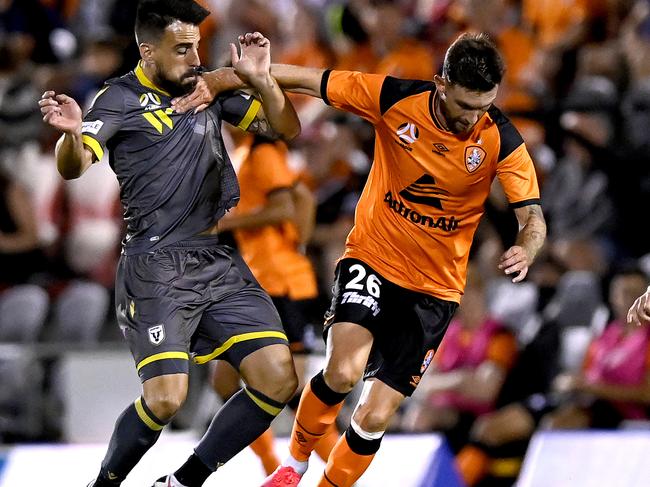 BRISBANE, AUSTRALIA - FEBRUARY 09: James O'Shea of the Roar takes on the defence during the A-League match between the Brisbane Roar and Macarthur FC at Dolphin Stadium, on February 09, 2021, in Brisbane, Australia. (Photo by Bradley Kanaris/Getty Images)