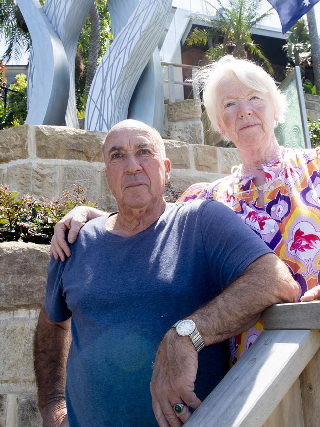 Norbert Wyzenbeek and wife Sharon with the statue.