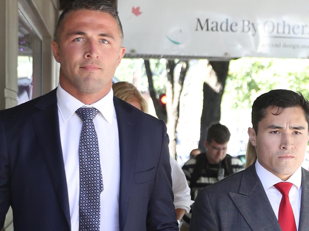 Sam Burgess arrives at Moss Vale court with his legal team which includes Brian Wrench. Picture: John Grainger