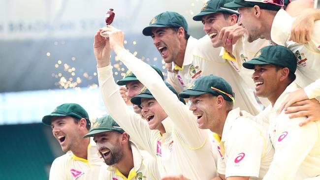 Steve Smith of Australia lifts the Ashes Trophy.