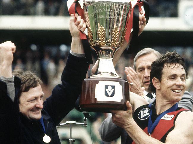 Kevin Sheedy and Terry Daniher with premiership cup in 1985.