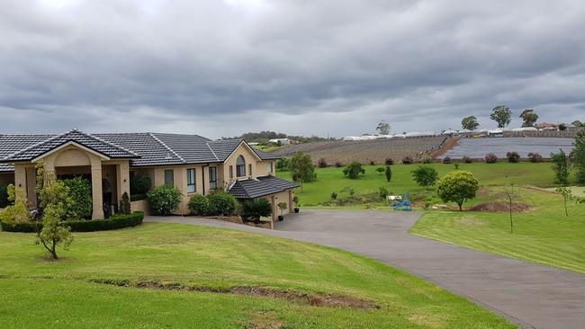 Homes in Cecil Park tend to be large, estate properties. This one looks over nearby farmland. Photo by Tony Ibrahim