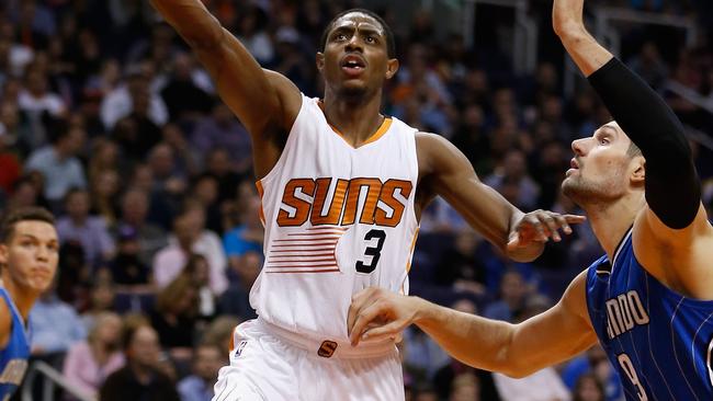 Brandon Knight of the Phoenix Suns attempts a lay up against the Orlando Magic during the second half.