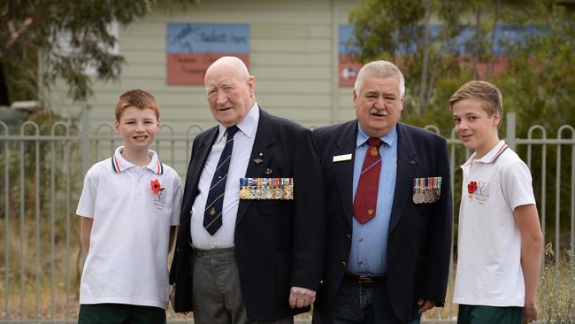 Corey, Angus Barrie, Vic Pilch and Nash mark the 10 year partnership between Thomas Chirnside Primary School and the Melbourne West Vietnam Veterans Association.