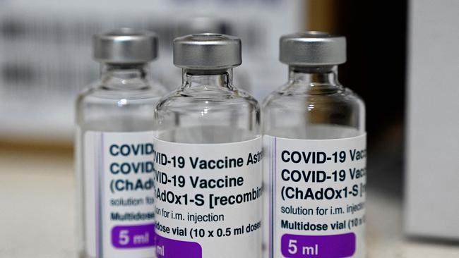 Empty vials of the AstraZeneca vaccine are seen on the counter at a walk-in Covid-19 vaccination centre at a pharmacy in Sydney. Picture: AFP