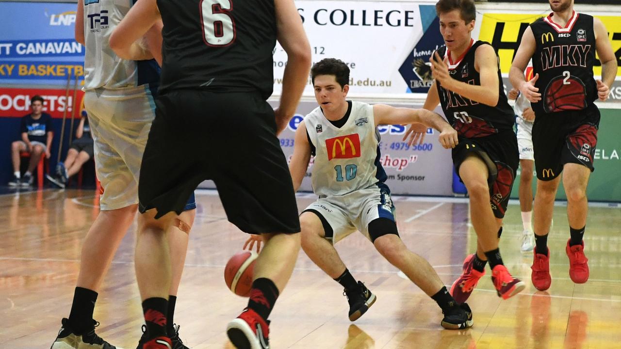BASKETBALL ConocoPhillips CQ Cup Rd 1: Rockhampton Rockets' Max Pickard with the ball