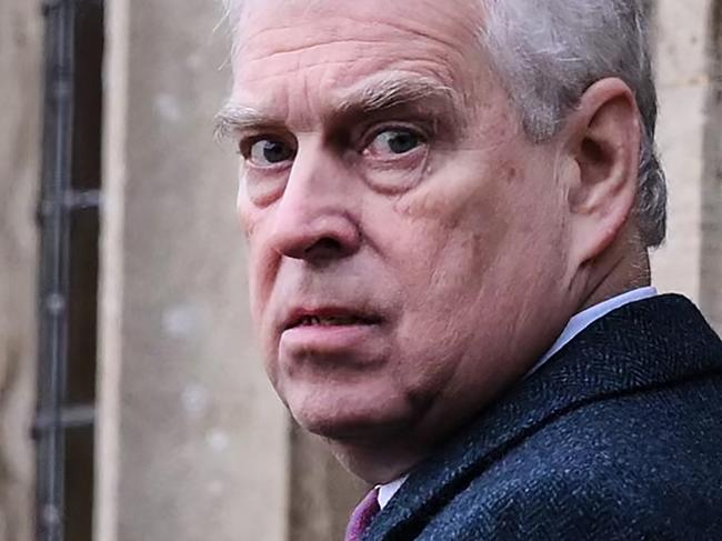 Britain's Prince Andrew, Duke of York reacts as he arrives for the Royal Family's traditional Christmas Day service at St Mary Magdalene Church in Sandringham, Norfolk, eastern England, on December 25, 2022. (Photo by Daniel LEAL / AFP)