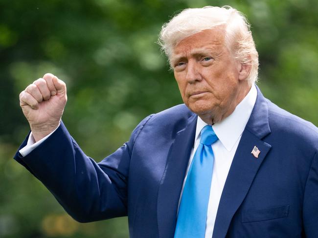 US President Donald Trump walks to Marine One on the South Lawn as he departs the White House in Washington, DC, en route to New Jersey for the weekend. Picture: AFP