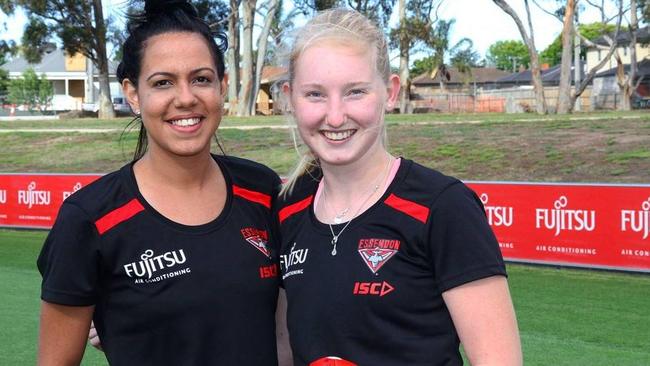 Michaela Long and Stephanie Hird train with Essendon's women's team.