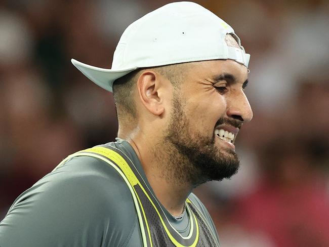 MELBOURNE, AUSTRALIA - JANUARY 13: Nick Kyrgios of Australia reacts against Jacob Fearnley of Great Britain in the Men's Singles First Round match during day two of the 2025 Australian Open at Melbourne Park on January 13, 2025 in Melbourne, Australia. (Photo by Kelly Defina/Getty Images)